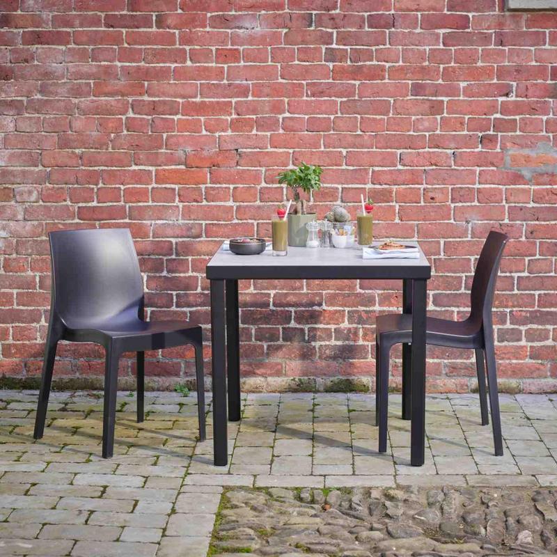 Kelly Ceramic Table in Concrete with 2 Emma Anthracite Side Chairs - main image