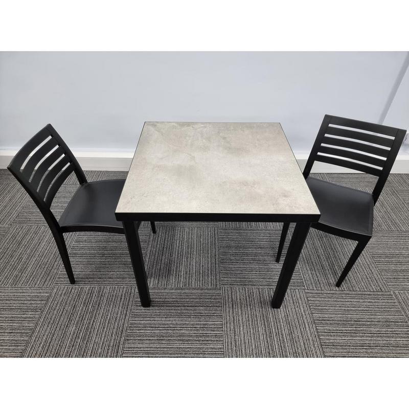 Kelly Ceramic Table in Concrete with 2 Tayla Anthracite Side Chairs - main image