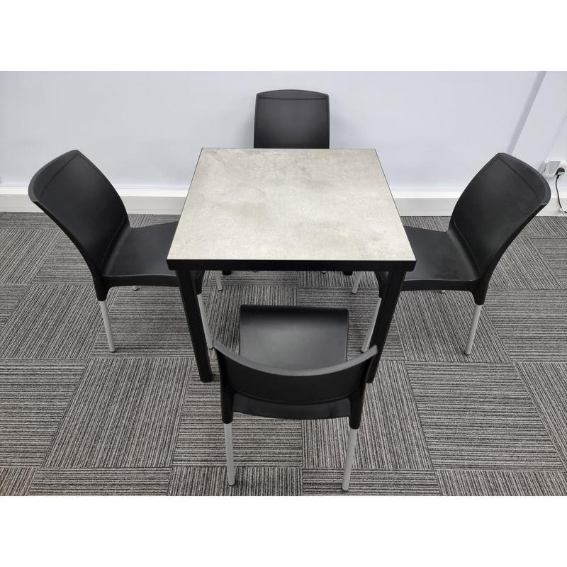 Kelly Ceramic Table in Concrete with 4 Alina Black Side Chairs - main image